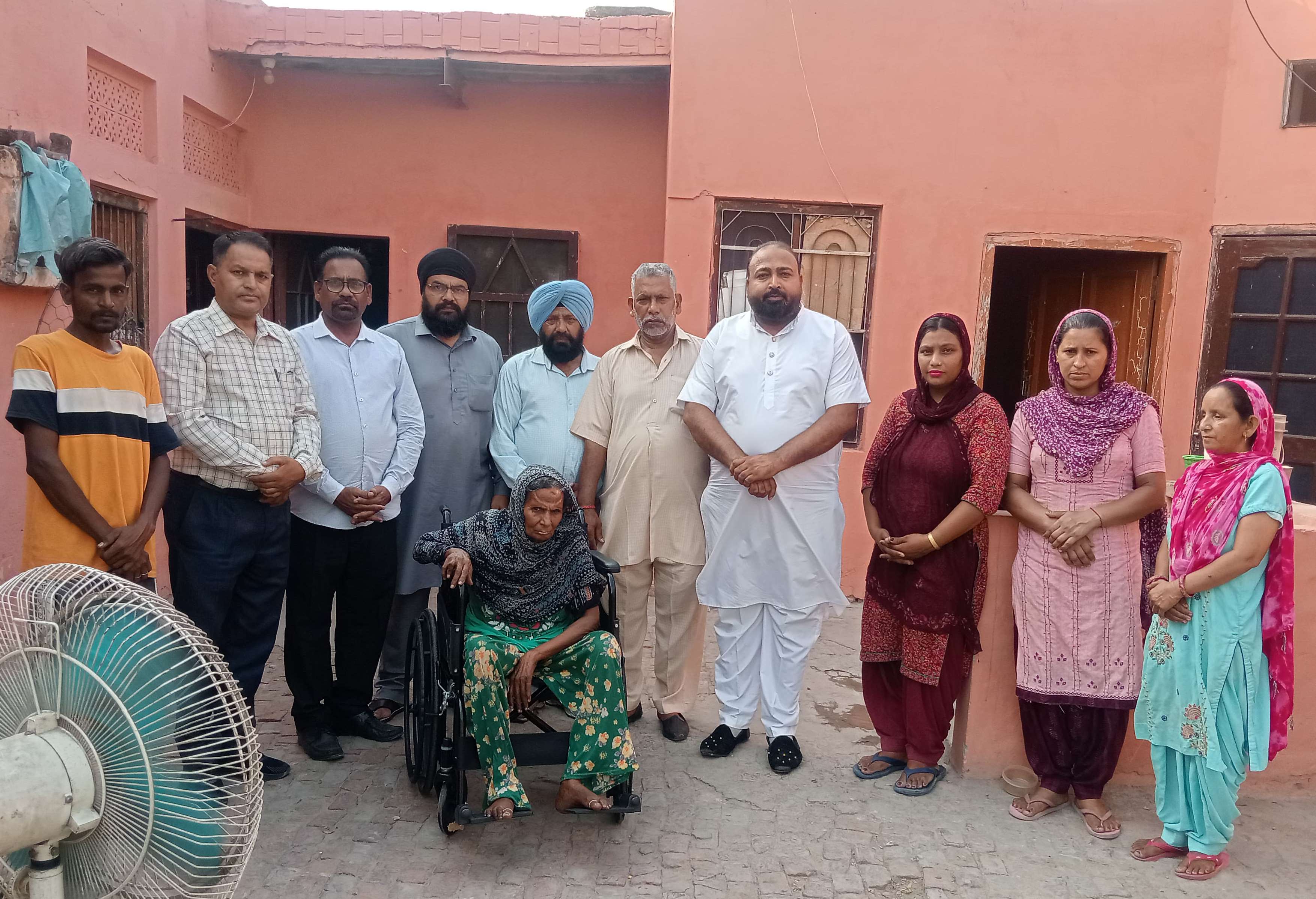 Raju Brother Welfare Society of UK and Punjab presents wheelchair to Satya Devi Rahon